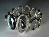 Armband metallisch aus Ovalen und Steinen