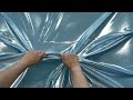 Stretch-Strickstoff mit Metallic-Effekt